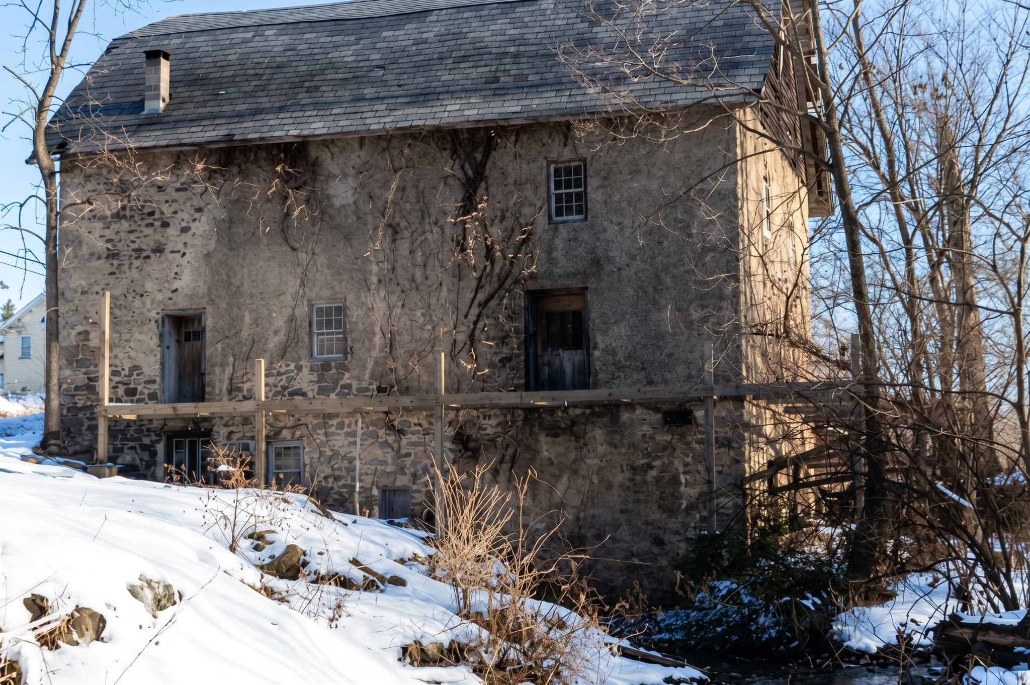 The same snowbound mill and scaffolding, contrast and detail recovered