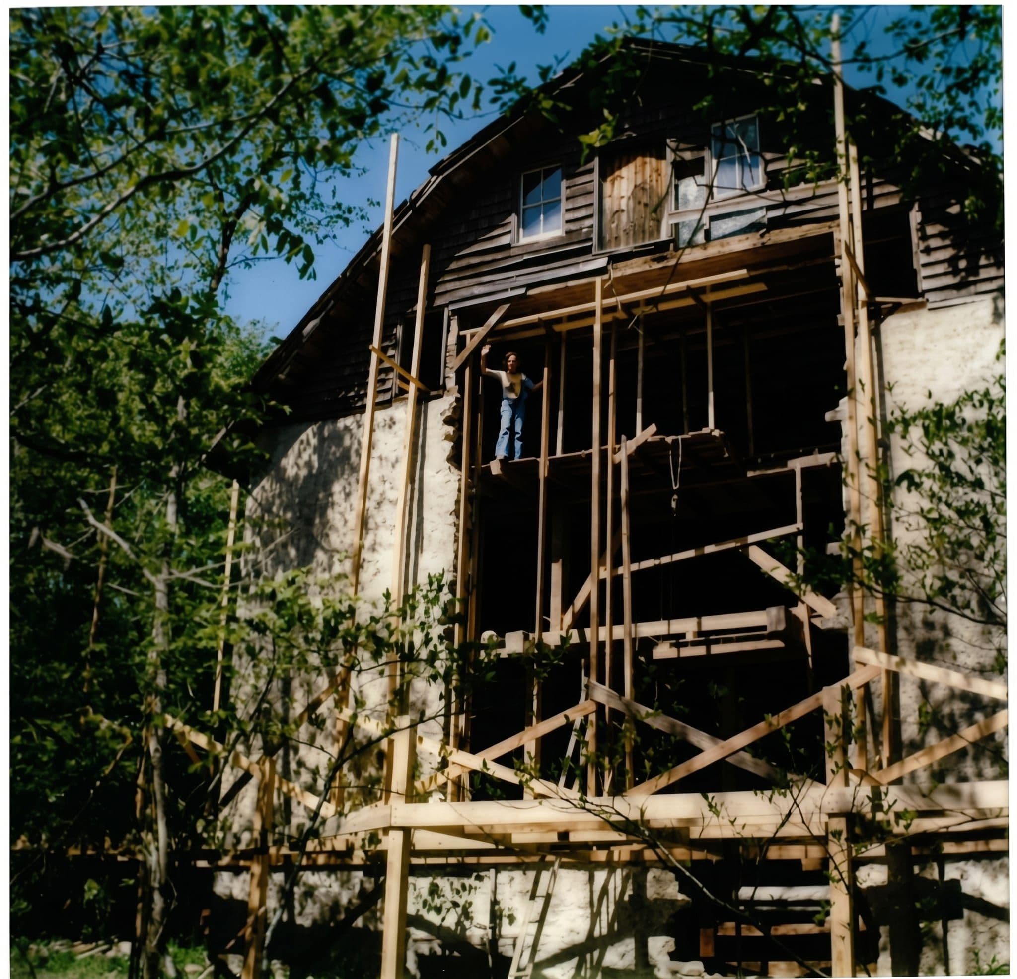 The same opened west end and scaffolding, colour and detail recovered
